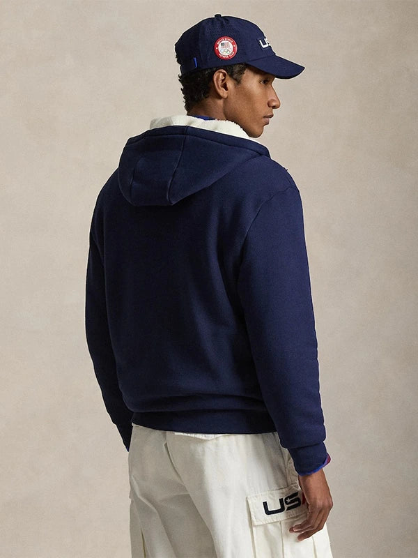 Navy blue fleece sherpa hoodie showcasing Team USA Milano Cortina 2026 Winter Olympics details