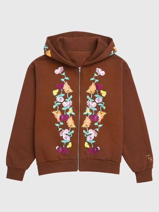 Recreation Taylor Swift Eras Tour brown zip-up hoodie with piano-inspired graphics.