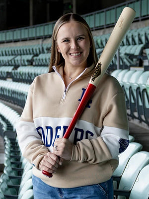 Los Angeles Dodgers UCLA Health Women’s Night Quarter Zip Sweatshirt featuring soft interior and clean logo detailing for everyday comfort