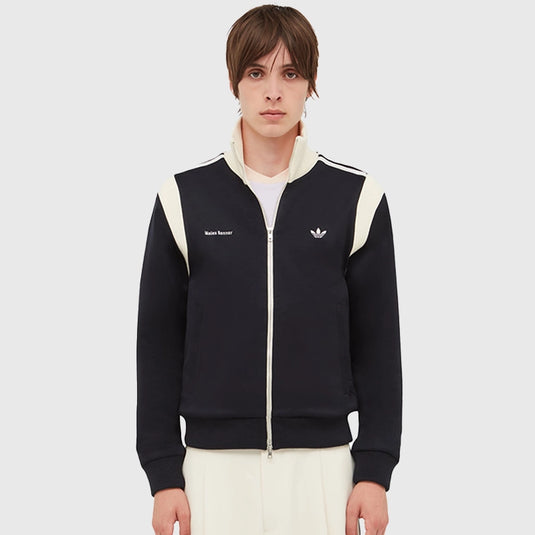 Recreation of Adidas x Wales Bonner 2025 unisex track jacket in black, merging sport heritage with refined design.