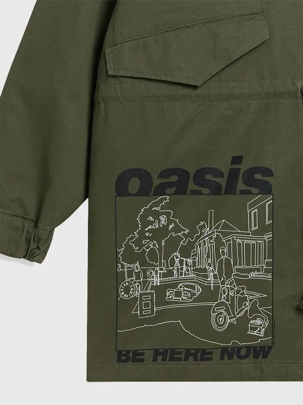 RECREATED Green Legendary Carnival Oasis 2026 Parka Jacket crafted with sturdy fabric construction and a relaxed longline profile