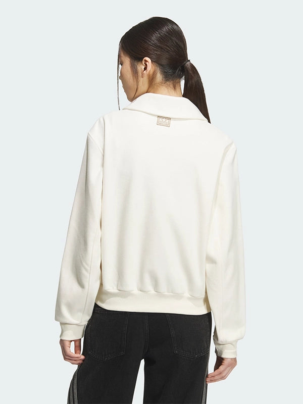 Recreation Adidas Lunar New Year SS26 sweatshirt in cream featuring a halfzip closure and warm fleece fabric