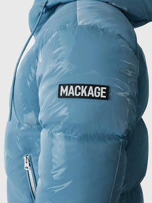 Recreated Andy Cohen NYE 2026 blue Mackage jacket with puffed design and detachable hood for cold-weather layering