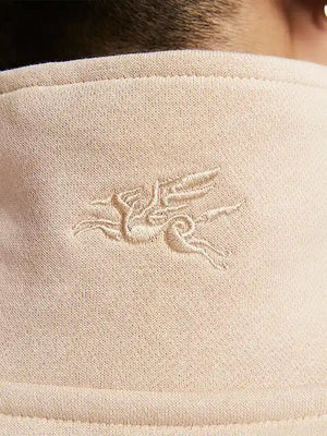Light beige quarter-zip sweatshirt inspired by Nike Sportswear China 2026 Year of the Horse collection with relaxed fit