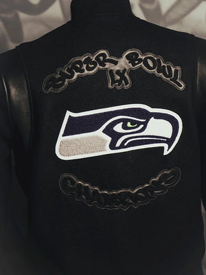 Seattle Seahawks Super Bowl LX champions parade jacket in black wool with embroidered Seahawks emblem and celebration lettering