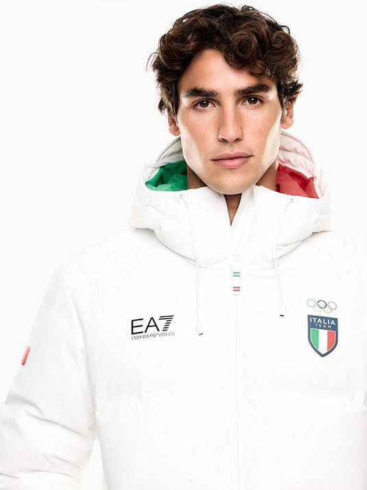 Milano Cortina 2026 themed white hooded ski puffer jacket by EA7 Emporio Armani featuring quilted insulation and weather-ready styling
