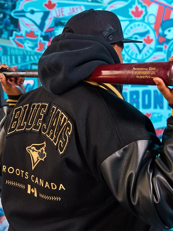 RECREATED Toronto Blue Jays 50th Anniversary Varsity Jacket in Black by Roots featuring a structured fit and refined detailing
