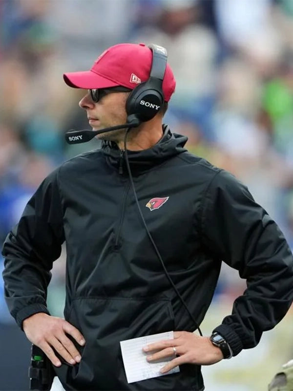 2025 Arizona Cardinals black half-zip hoodie jacket with coach-inspired sideline design for Jonathan Gannon.