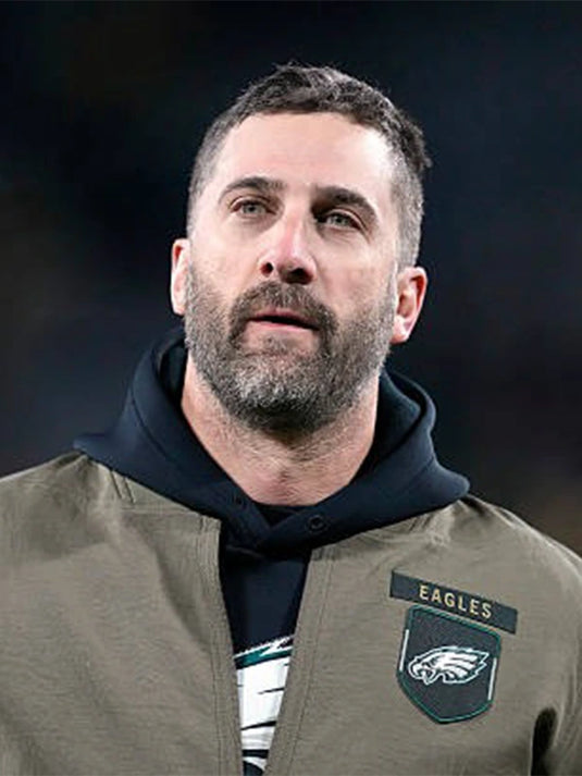 Olive green Salute to Service 2025 Philadelphia Eagles cotton bomber jacket combining comfort and sideline performance style.