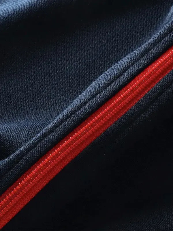 Recreated navy Chelsea FC Heritage Collection track jacket offering lightweight comfort and everyday sportswear style