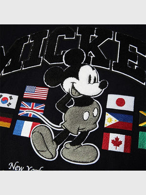 Recreated black wool varsity jacket featuring Disney x HUF Mickey Worldwide Tour graphics.