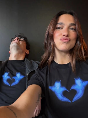 Unisex black graphic tee from Dua Lipa Two Hearts 2026 collection with soft cotton and bold print