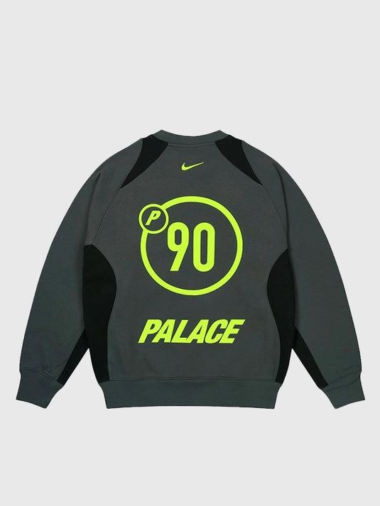 2025 Palace x Nike Total P90 sweatshirt in charcoal grey featuring soft fleece and refined co-branding.
