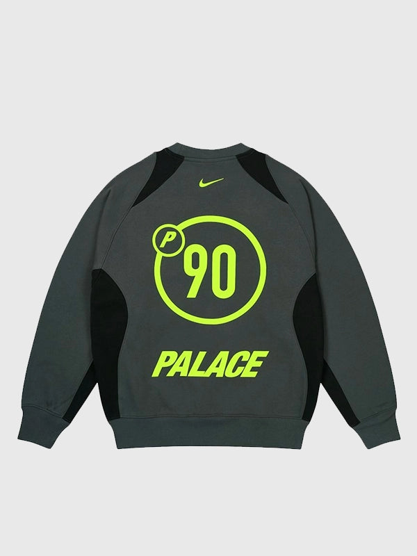 2025 Palace x Nike Total P90 sweatshirt in charcoal grey featuring soft fleece and refined co-branding.