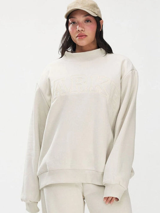 Monochrome fleece varsity sweatshirt from Parke 2026 featuring a clean mockneck design