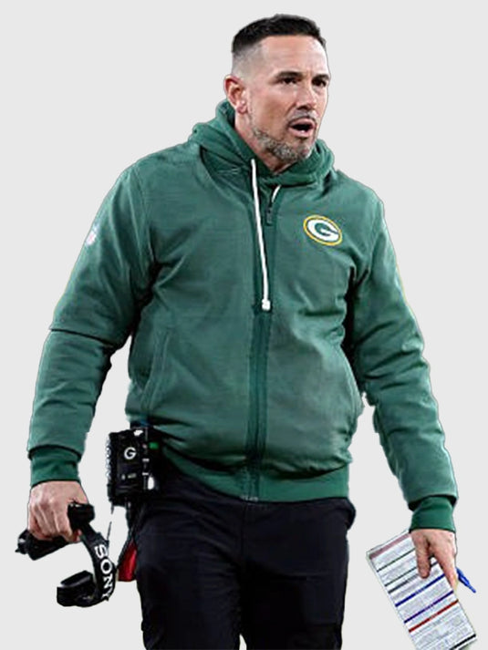 Recreated green Nike sideline bomber jacket reflecting Green Bay Packers coach aesthetics and modern sportswear fit