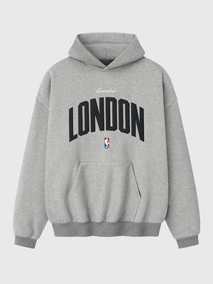 Oversized grey fleece hoodie from Fear of God x London Game 90s collection with vintage athletic styling