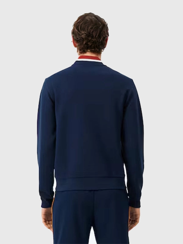 RECREATED Lacoste Roland-Garros 2026 Ballboy Navy Bomber Jacket showcasing a classic bomber profile with refined athletic detailing