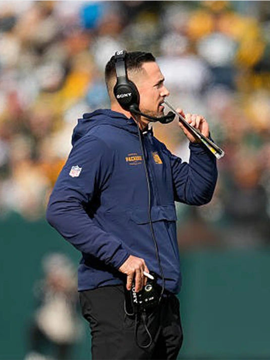 Matt LaFleur–inspired Green Bay Packers Nike 23 Classic Anorak Jacket in navy with half-zip closure.