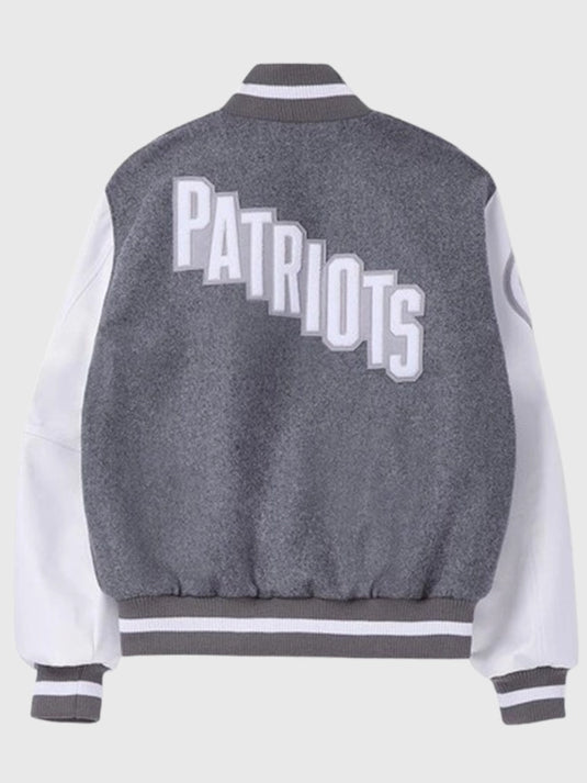 Grey and white recreated Rivalries varsity jacket combining Patriots styling with CNCPTS and Nike touches.