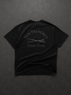 Recreated oversized black T‑shirt from Gap × Sushi Club with bold graphic and dropped shoulder styling