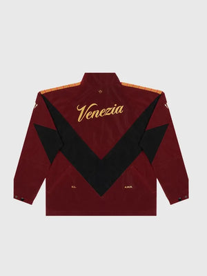 Unisex Nike Nocta x Venezia 25/26 red track jacket offering lightweight comfort and modern streetwear appeal