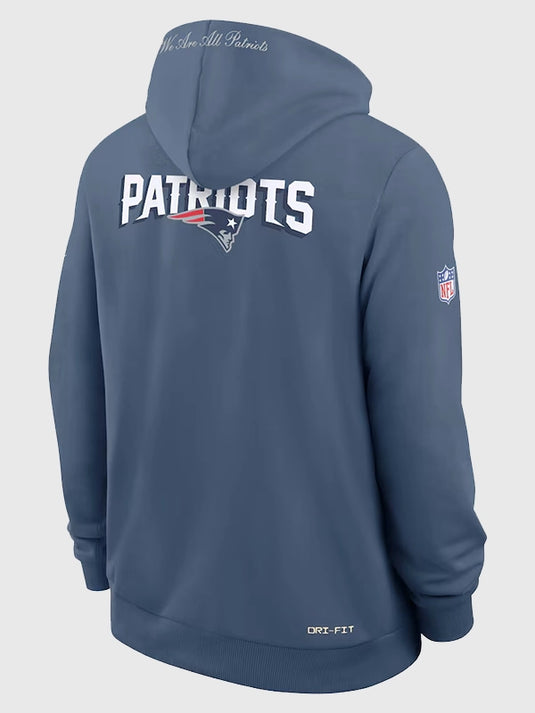 Nike storm blue Patriots 2025 pullover hoodie with We Are All Patriots graphics and a comfortable fit.