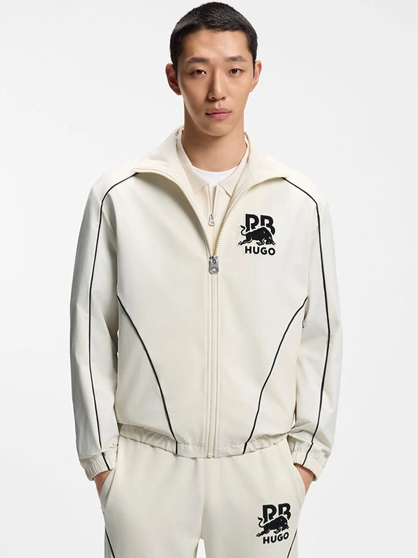 RECREATED White Hugo x Red Bull 2026 Bull Motif Full Zip Track Jacket designed with a clean sporty silhouette and striking bull emblem accent