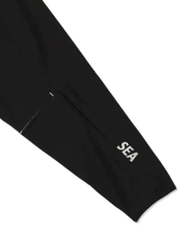 PlayStation x Wind and Sea–inspired black jacket designed with a technical outerwear silhouette
