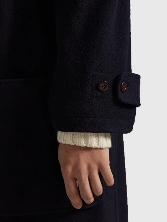 Milano Cortina 2026 themed navy blue Flagbearer toggle coat by Polo Ralph Lauren featuring functional toggles and tailored fit