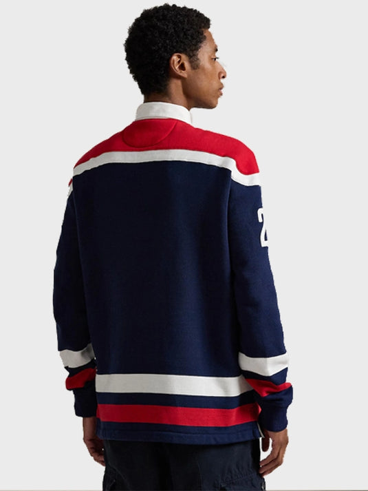 Team USA inspired navy blue rugby sweatshirt from Polo Ralph Lauren with structured fit and winter sports aesthetic