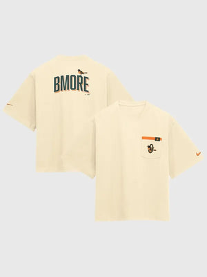 Recreated Baltimore Orioles Nike cream 2026 City Connect pocket boxy t-shirt with clean team detailing and relaxed streetwear fit