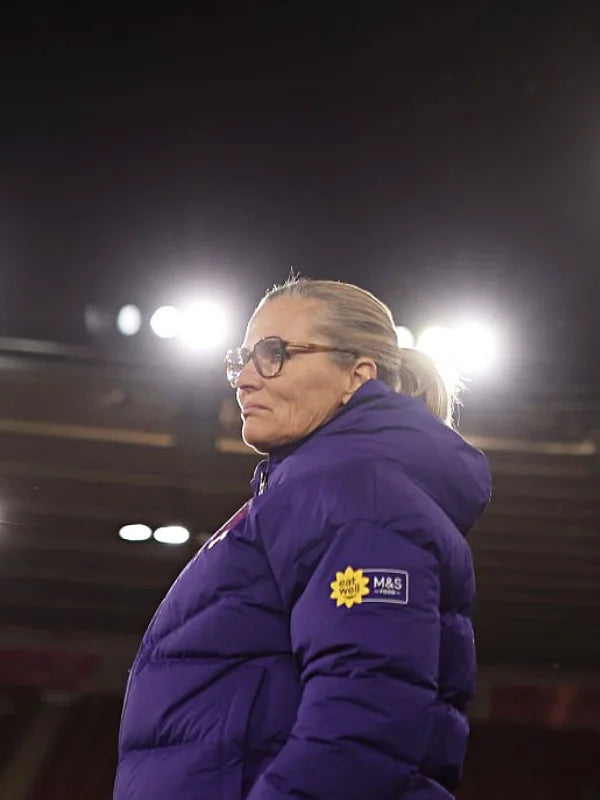 Purple women’s hooded puffer jacket recreated from Nike x England Lionesses inspired by Sarina Wiegman and international play