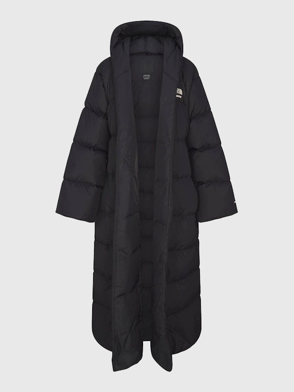 The North Face × SKIMS black wrap-style Nuptse parka recreated with thick insulation and sleek winter-ready design.