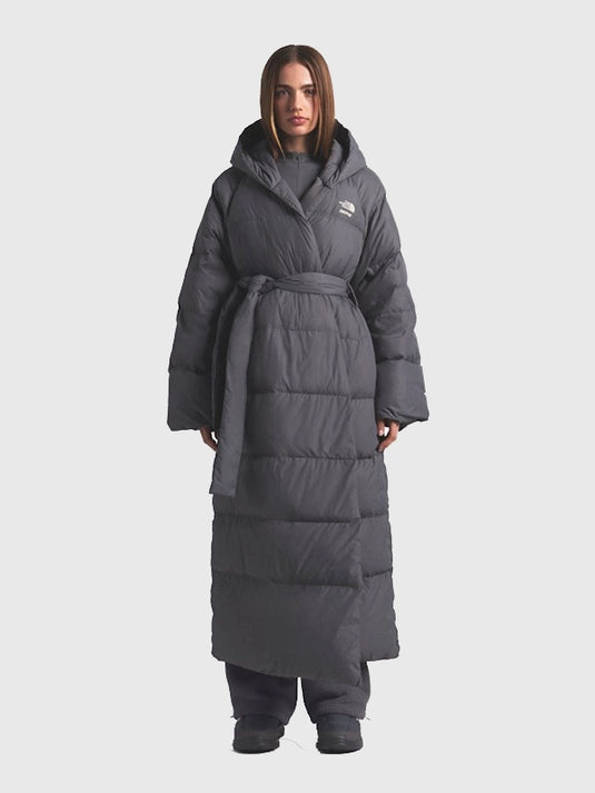 The North Face × SKIMS grey wrap-style Nuptse parka recreated with plush padding and durable weather-ready fabric.