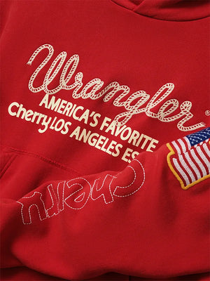 Cherry x Wrangler–inspired Los Angeles pullover hoodie in red showcasing bold America’s Favorite design