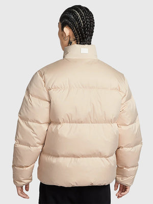 Nike limited edition full-zip puffer jacket in light beige featuring lightweight parachute material and warm insulation
