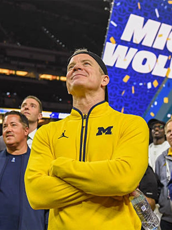 Recreated Michigan Wolverines Coach Dusty May pullover jacket in yellow with sleek fit and minimal team-inspired detailing