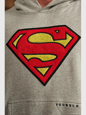 Grey fleece pullover hoodie inspired by Superman Legacy theme featuring oversized streetwear silhouette